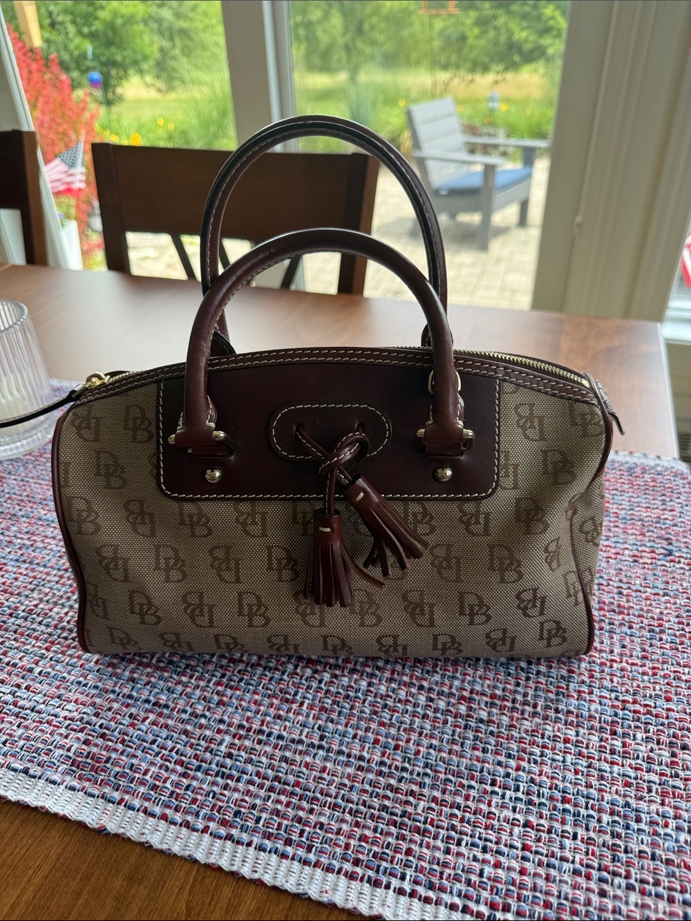 Dooney and Bourke Medium Domed Tassel satchel -monogram print /mahogany leather